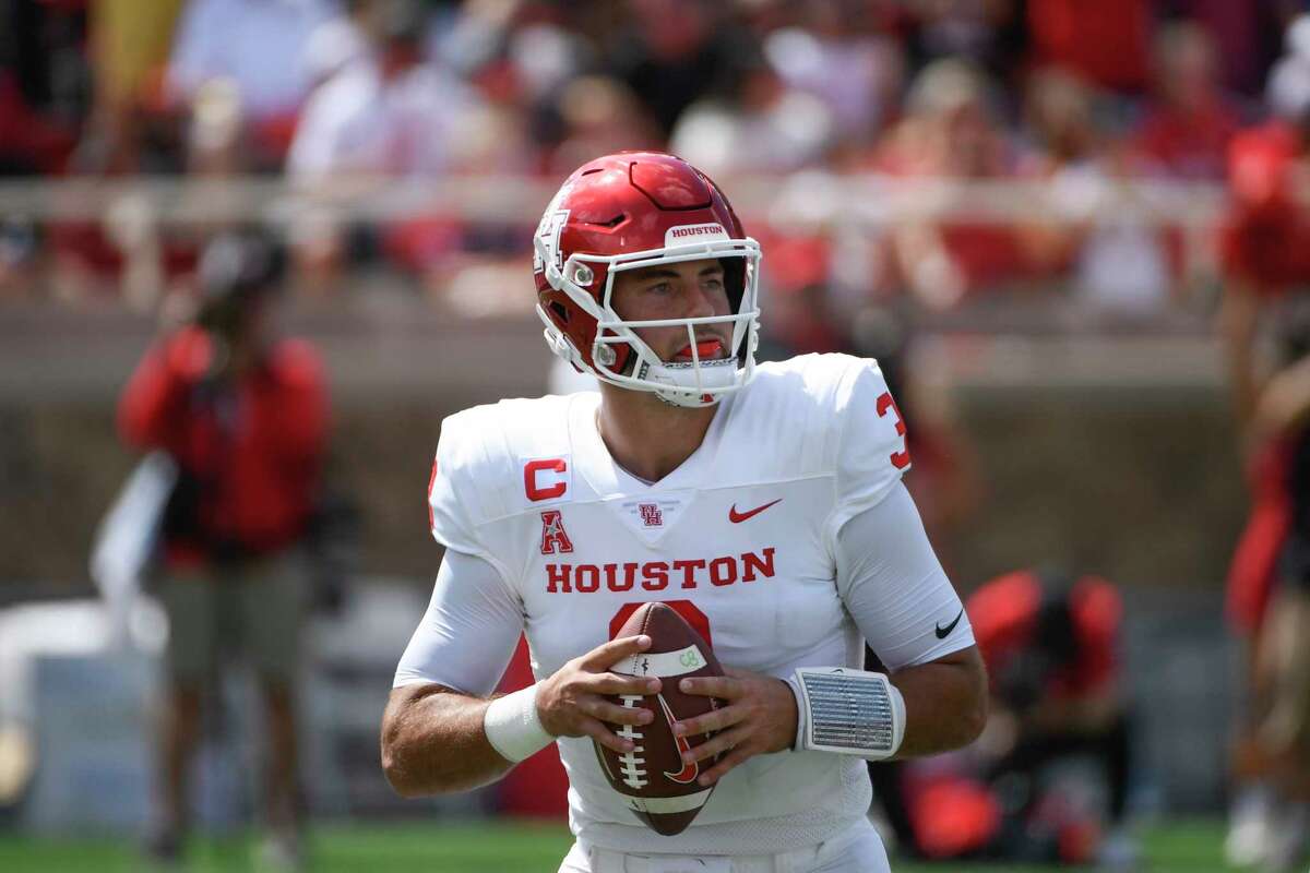 Houston quarterback Clayton Tune (3) drops back to pass against Texas Tech during the first half of an NCAA college football game Saturday, Sept. 10, 2022, in Houston. (AP Photo/Justin Rex)