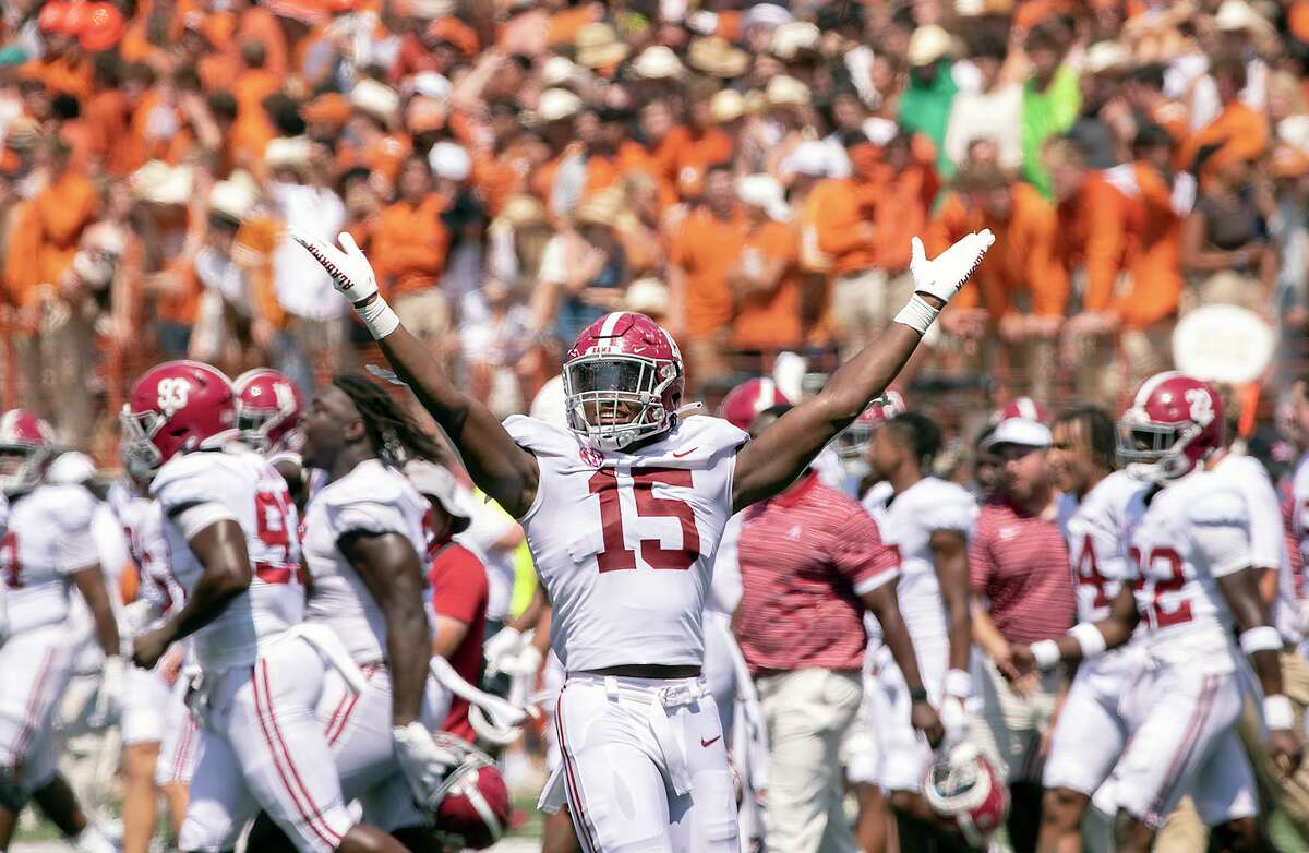 Alabama linebacker Dallas Turner (15) celebrates the end of the game as time runs out for Texas during the second half of an NCAA college football game, Saturday, Sept. 10, 2022, in Austin, Texas. Alabama defeated Texas 20-19.