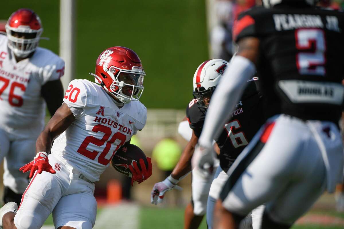 Houston running back Brandon Campbell (20) runs the ball against Texas Tech during the second half of an NCAA college football game Saturday, Sept. 10, 2022, in Lubbock, Texas. (AP Photo/Justin Rex)