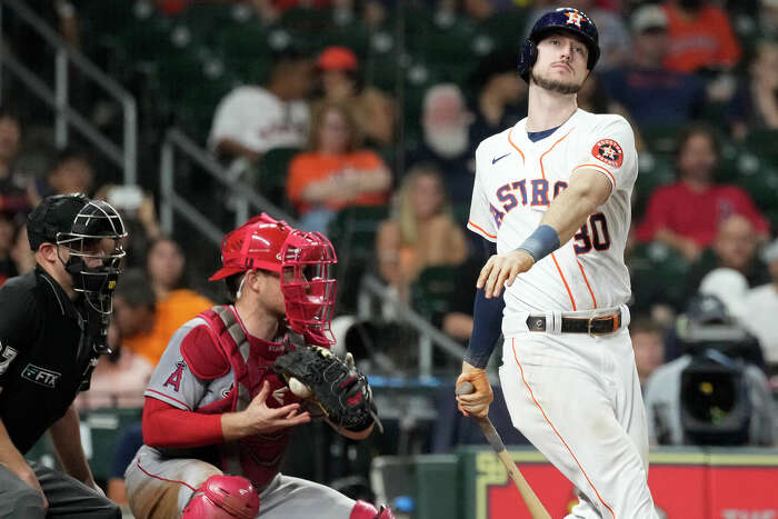 Fans call out to Houston Astros players from above the dugout after the  Astros defeated the Los Angeles Angels 10-4 in their second baseball game,  in Monterrey, Mexico, Sunday, May 5, 2019. (