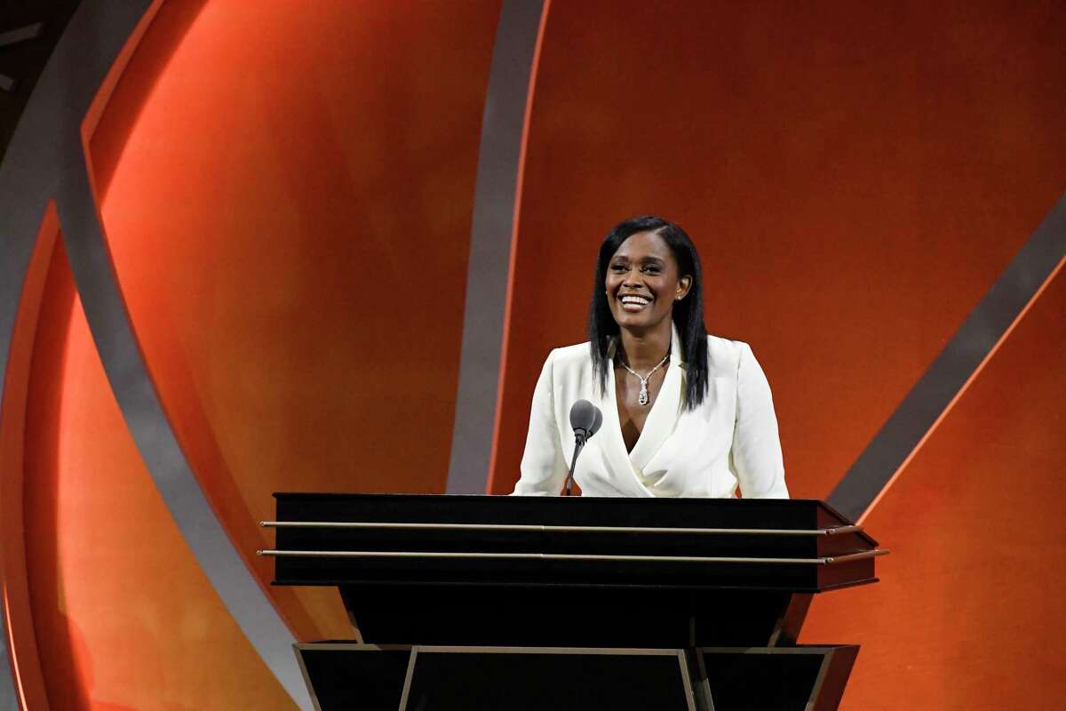 Swin Cash speaks during her enshrinement at the Basketball Hall of Fame, Saturday, Sept. 10, 2022, in Springfield, Mass. (AP Photo/Jessica Hill)