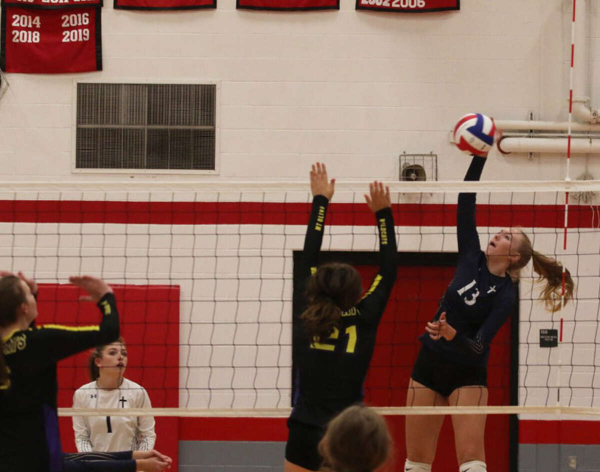 Father McGivney's Sami Oller goes up for an attack during a match in the Volley for Grace Tournament at Nokomis over the weekend.