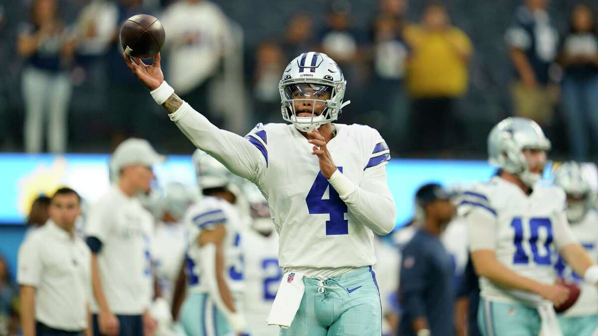 Dallas Cowboys quarterback Dak Prescott (4) warms up before an NFL football game against the Los Angeles Chargers Wednesday, Aug. 24, 2022, in Inglewood, Calif.