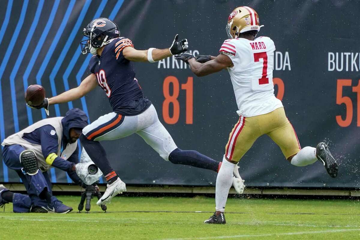 Chicago Bears' Dante Pettis reaches for the endzone for a touchdown reception during the second half of an NFL football game against the San Francisco 49ers Sunday, Sept. 11, 2022, in Chicago. (AP Photo/Charles Rex Arbogast)