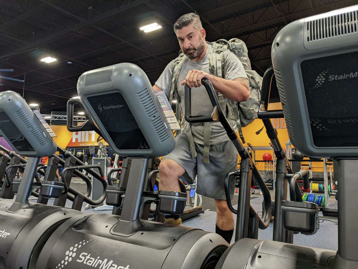 Crunch Fitness General Manager and military veteran Juan Mario Cadena does the challenge. Crunch Fitness challenge "9/11 Stair Climb" held on Sunday Sept. 11, 2022 aims to honor the journey firefighters took on the way to save lives on ground zero. 