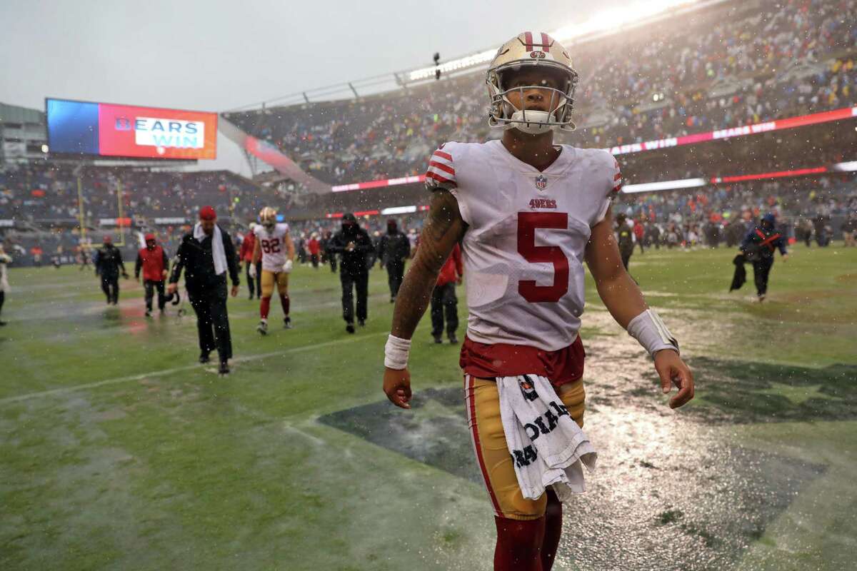 San Francisco 49ers’ Trey Lance leaves the field after the 19-10 loss to the Chicago Bears at Soldier Field.