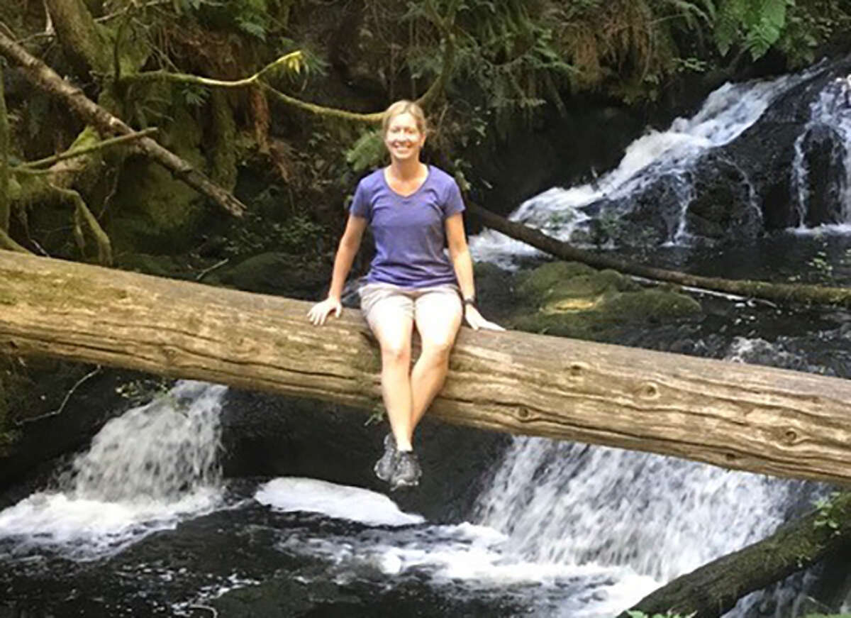 Edwardsville graduate Jamie Schwear enjoys the Pacific Northwest old growth forest recently in Port Ludlow, Washington, while visiting family. Schwear now lives in Australia.