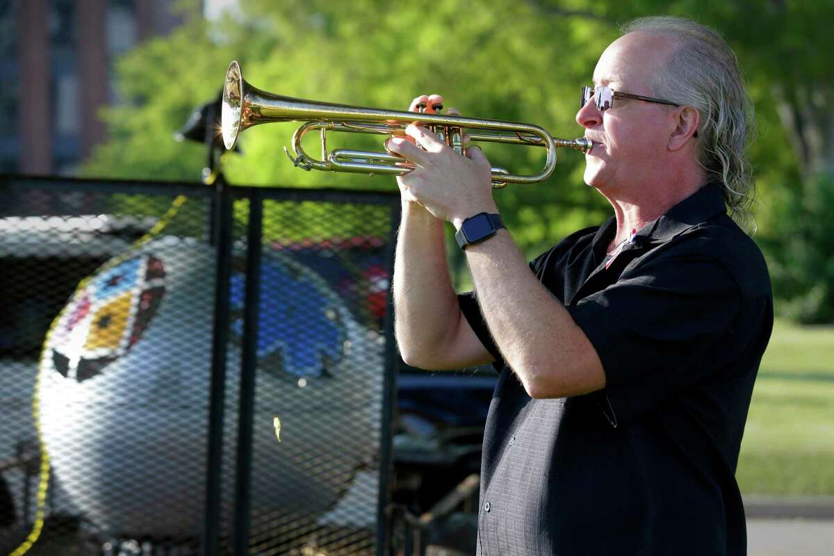 Stephen Kloesel plays “Taps” during a September 11th Observance ceremony.