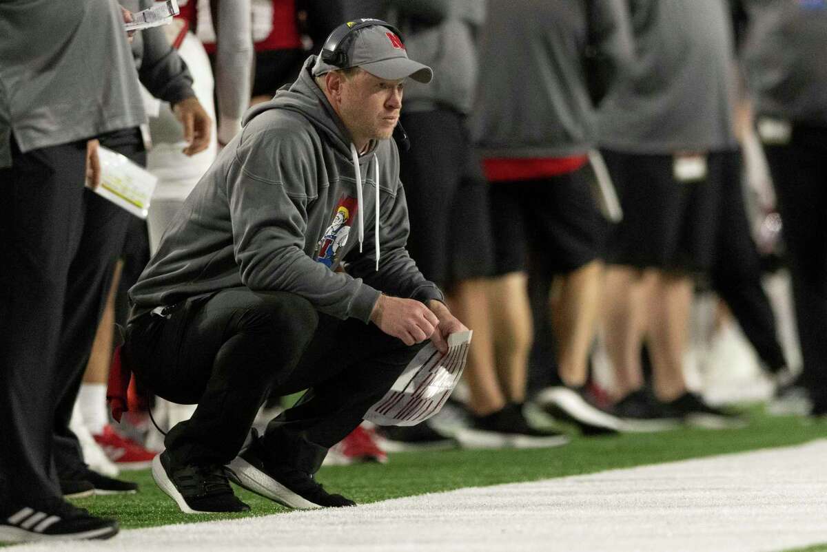 Nebraska head coach Scott Frost crouches on the sideline following a touchdown by Georgia Southern during the first half of an NCAA college football game Saturday, Sept. 10, 2022, in Lincoln, Neb. (AP Photo/Rebecca S. Gratz)