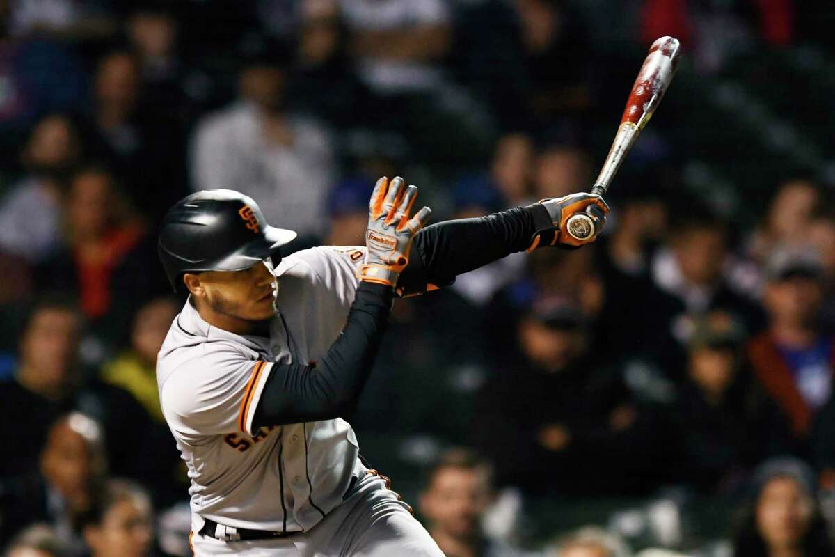 Giants SS Thairo Estrada leaves game after getting hit on helmet by pitch -  ESPN