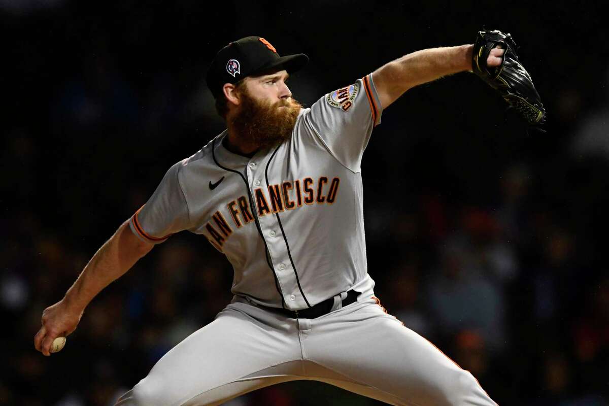 San Francisco Giants starter John Brebbia delivers a pitch during the first inning of a baseball game against the Chicago Cubs Sunday, Sept. 11, 2022, in Chicago. (AP Photo/Paul Beaty)
