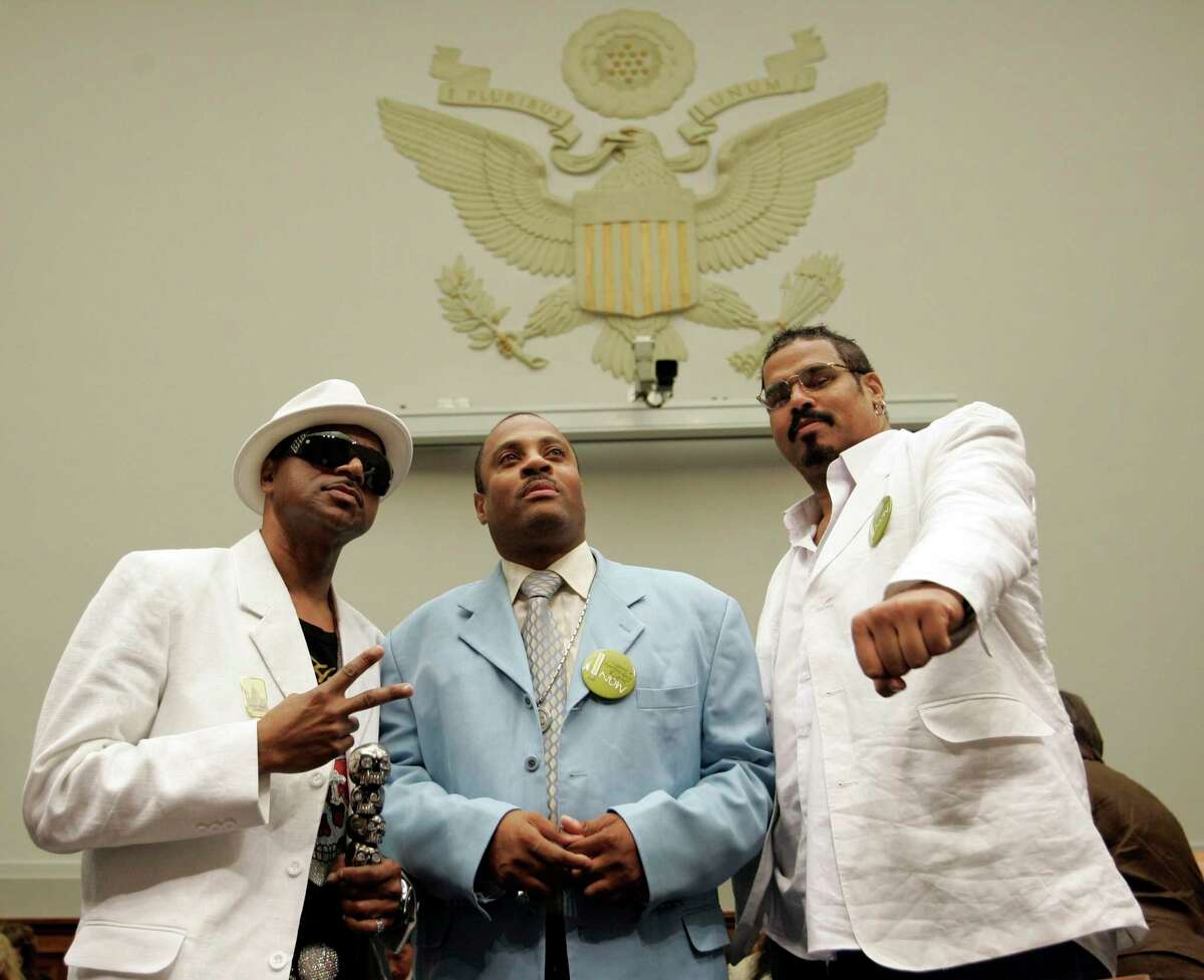 Hendogg from The Sugarhill Gang, left, Grandmaster Dee of Whodini, center, and Wonder Mike of The Sugarhill Gang pose for a photo in Washington, D.C., in June 2008.