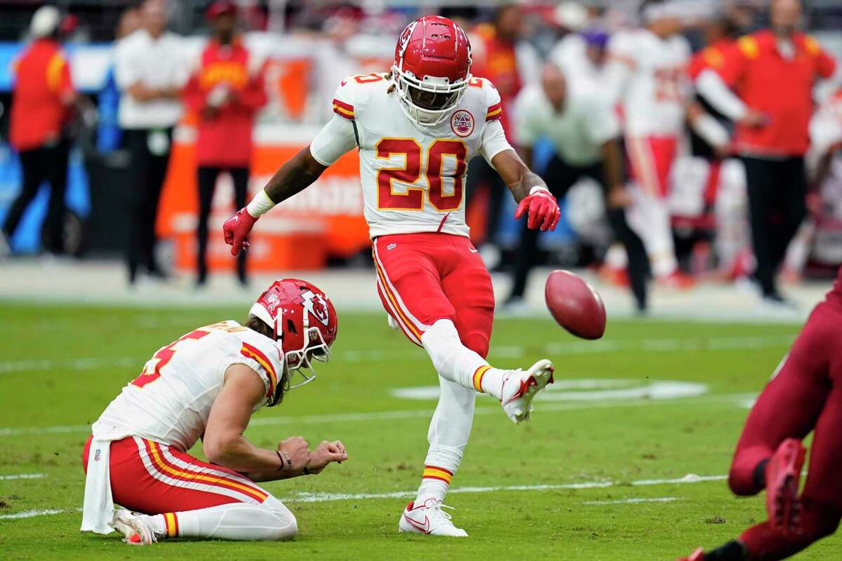 Kansas City Chiefs safety Justin Reid (20) kicks an extra point