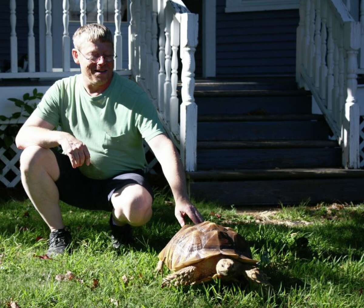 The next time you see Chris Poiter and Mongo around Collinsville, feel free to stop and greet them. Mongo, a 35-pound male sulcata tortoise, enjoys his neighbors.