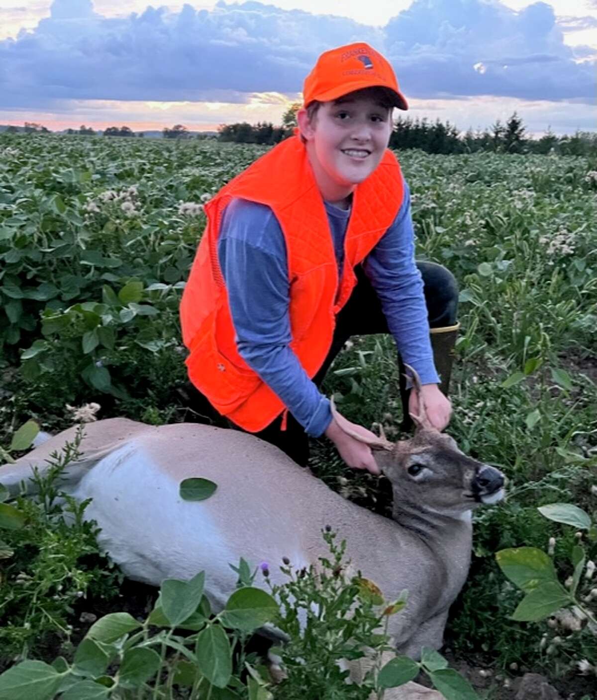 Orlando Lounsbury, 13, of Dayton, Ohio, was proud of the five-point buck that he dropped on the spot with one shot at 100 yards during the recent Liberty Hunt in Michigan.