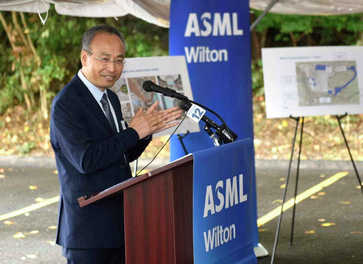 Louis Lu, head of the ASML Wilton site, speaks during the groundbreaking of the expansion of ASML's research and development facility in Wilton.