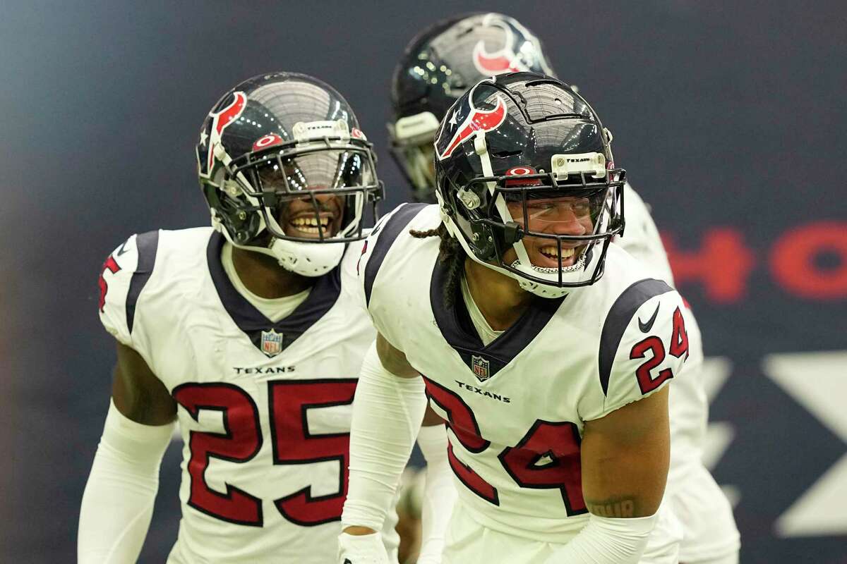Houston Texans cornerback Derek Stingley Jr. (24) celebrates after breaking up a pass in the end zone during the second half of an NFL football game Sunday, Sept. 11, 2022, in Houston.