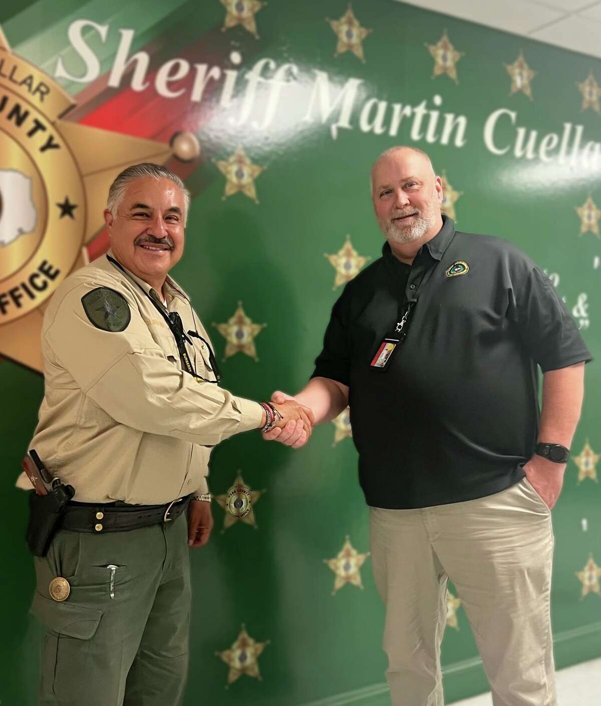 Sheriff Martin Cuellar is congratulated because the Webb County Jail passed its inspection.