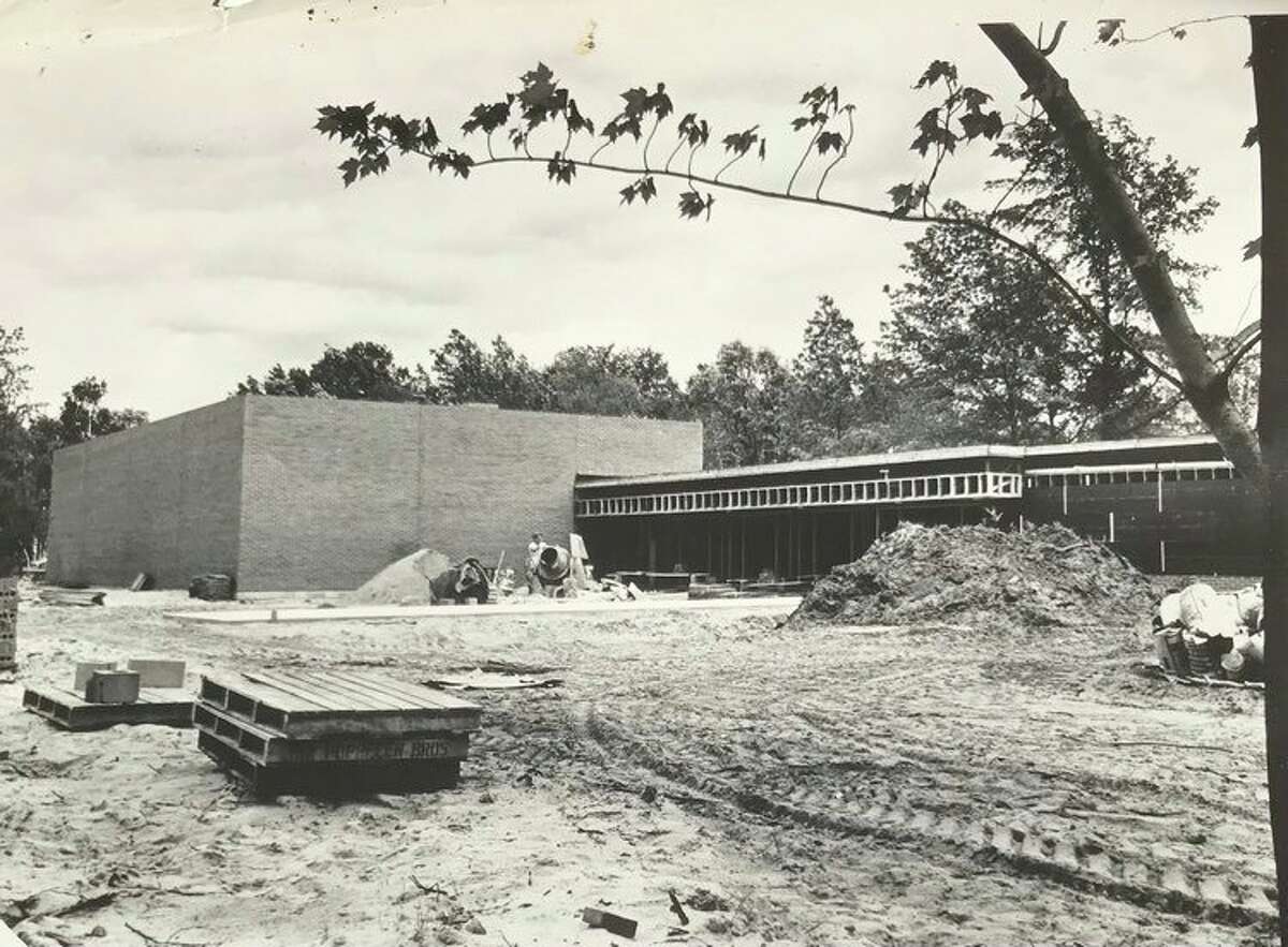 The Bullock Creek Junior/Senior High School under construction. A note on the back referred to the building as "Bullock Creek (2 in 1) school. Circa 1962