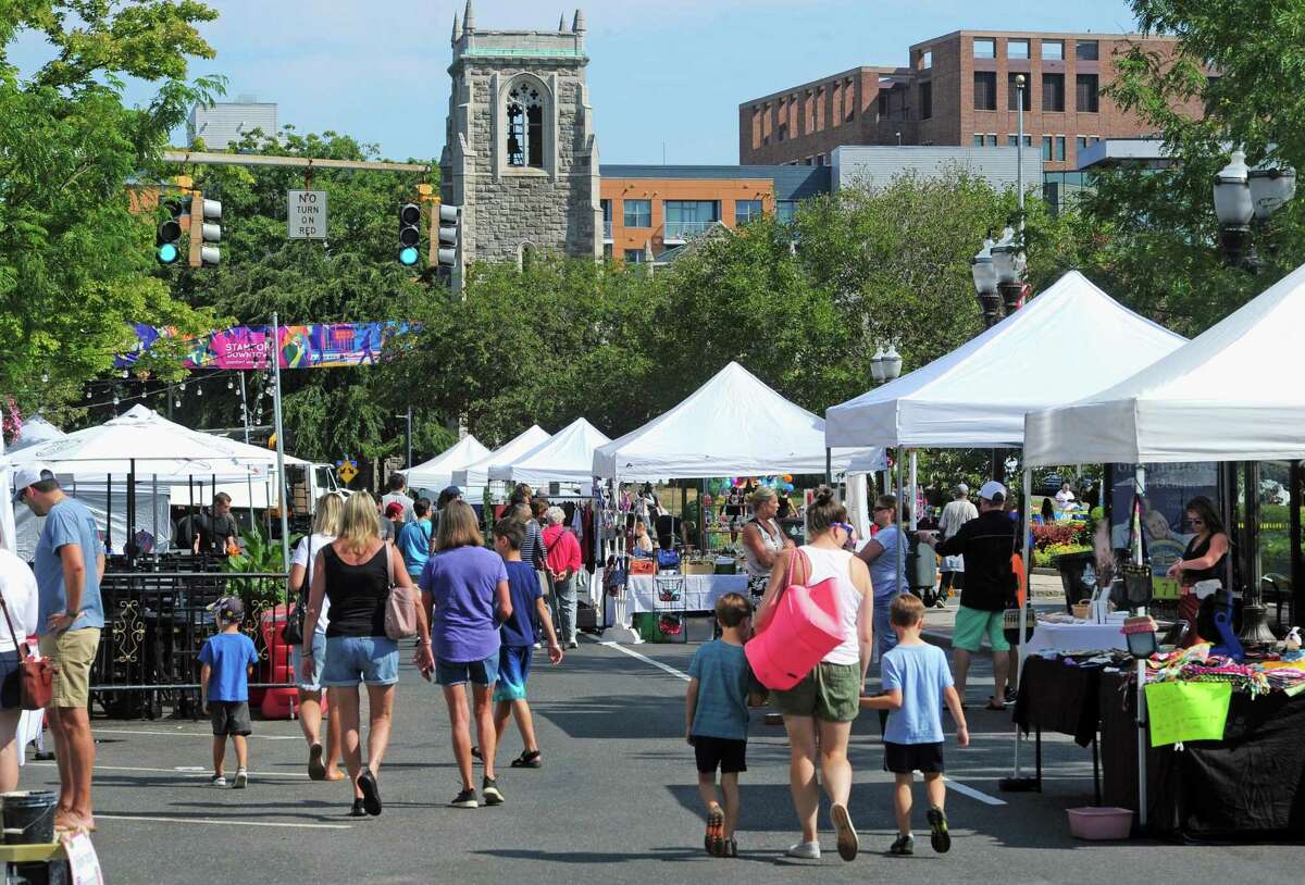 The annual Arts & Crafts on Bedford event on Bedford Street in downtown Stamford, Conn., on Saturday September 10, 2022. Arts & Crafts on Bedford brings juried artisans from throughout the Northeast who will display and sell juried works including ceramics, fiber arts, fine art, jewelry, metal, photography, painting, wood and more. Arts & Crafts on Bedford is presented by Stamford Downtown Special Services District and sponsored by 95.9 The Fox, Star 99.9, WEBE 108 and Happyhaha.com Photography.