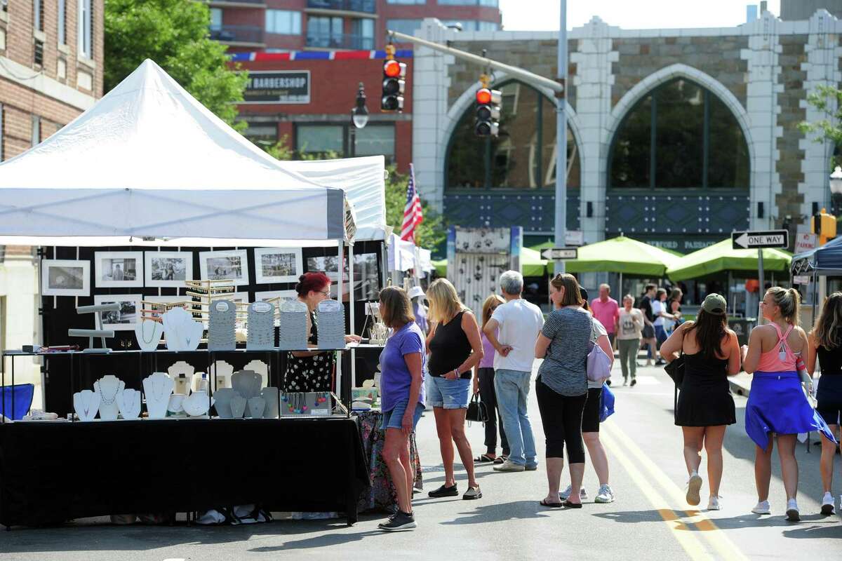 The annual Arts & Crafts on Bedford event on Bedford Street in downtown Stamford, Conn., on Saturday September 10, 2022. Arts & Crafts on Bedford brings juried artisans from throughout the Northeast who will display and sell juried works including ceramics, fiber arts, fine art, jewelry, metal, photography, painting, wood and more. Arts & Crafts on Bedford is presented by Stamford Downtown Special Services District and sponsored by 95.9 The Fox, Star 99.9, WEBE 108 and Happyhaha.com Photography.