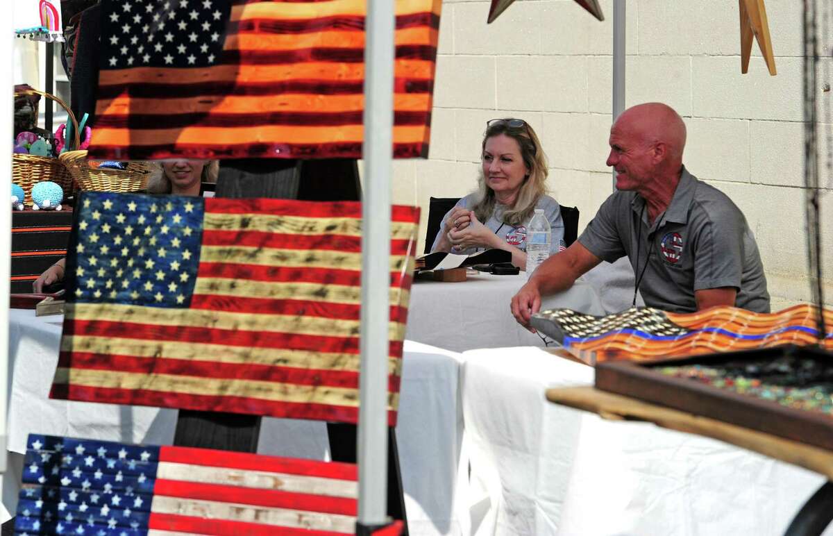 The annual Arts & Crafts on Bedford event on Bedford Street in downtown Stamford, Conn., on Saturday September 10, 2022. Arts & Crafts on Bedford brings juried artisans from throughout the Northeast who will display and sell juried works including ceramics, fiber arts, fine art, jewelry, metal, photography, painting, wood and more. Arts & Crafts on Bedford is presented by Stamford Downtown Special Services District and sponsored by 95.9 The Fox, Star 99.9, WEBE 108 and Happyhaha.com Photography.