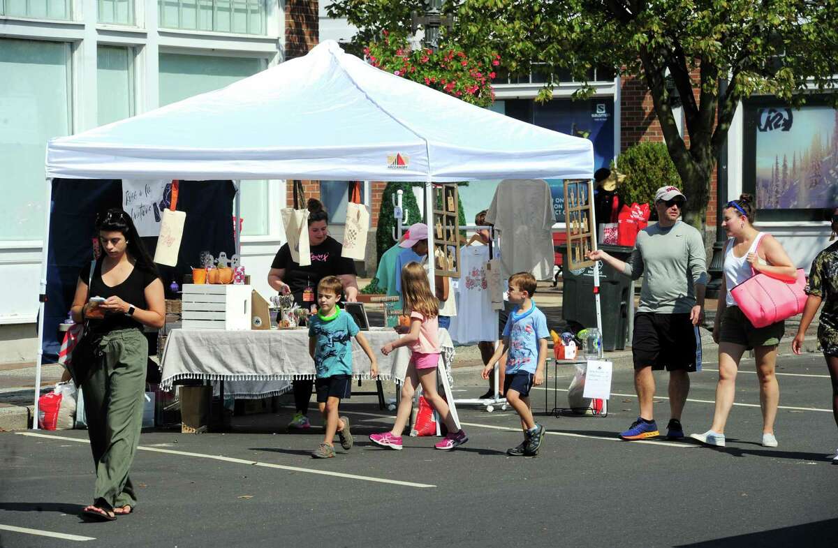 The annual Arts & Crafts on Bedford event on Bedford Street in downtown Stamford, Conn., on Saturday September 10, 2022. Arts & Crafts on Bedford brings juried artisans from throughout the Northeast who will display and sell juried works including ceramics, fiber arts, fine art, jewelry, metal, photography, painting, wood and more. Arts & Crafts on Bedford is presented by Stamford Downtown Special Services District and sponsored by 95.9 The Fox, Star 99.9, WEBE 108 and Happyhaha.com Photography.