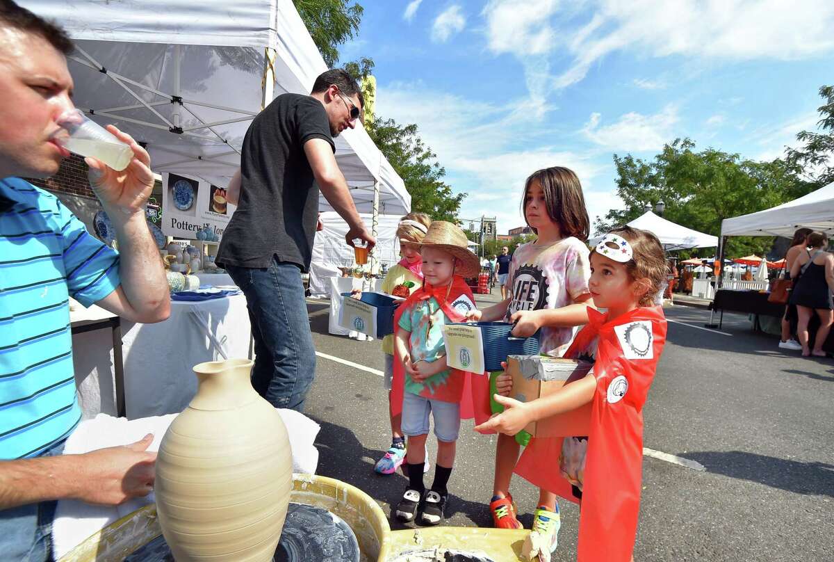 The annual Arts & Crafts on Bedford event on Bedford Street in downtown Stamford, Conn., on Saturday September 10, 2022. Arts & Crafts on Bedford brings juried artisans from throughout the Northeast who will display and sell juried works including ceramics, fiber arts, fine art, jewelry, metal, photography, painting, wood and more. Arts & Crafts on Bedford is presented by Stamford Downtown Special Services District and sponsored by 95.9 The Fox, Star 99.9, WEBE 108 and Happyhaha.com Photography.