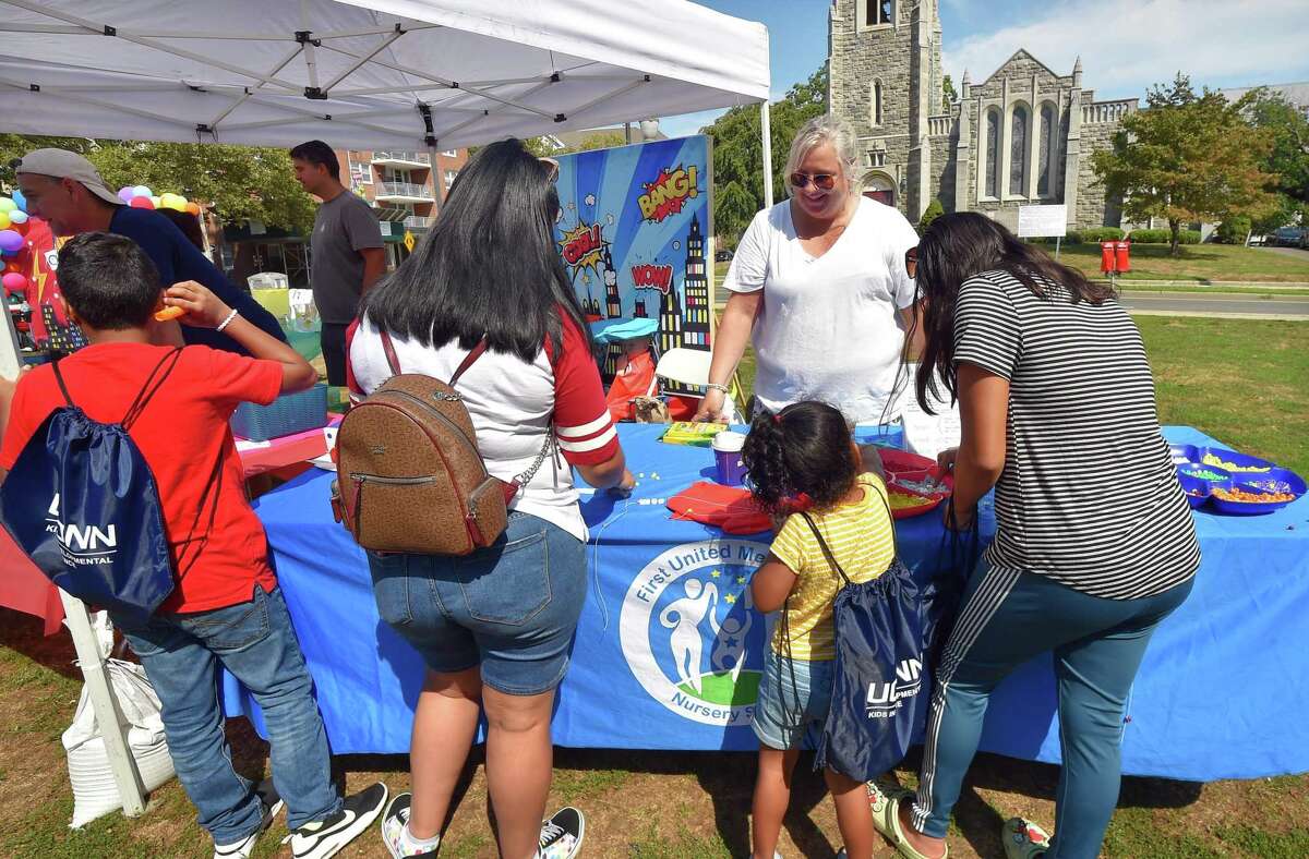The annual Arts & Crafts on Bedford event on Bedford Street in downtown Stamford, Conn., on Saturday September 10, 2022. Arts & Crafts on Bedford brings juried artisans from throughout the Northeast who will display and sell juried works including ceramics, fiber arts, fine art, jewelry, metal, photography, painting, wood and more. Arts & Crafts on Bedford is presented by Stamford Downtown Special Services District and sponsored by 95.9 The Fox, Star 99.9, WEBE 108 and Happyhaha.com Photography.