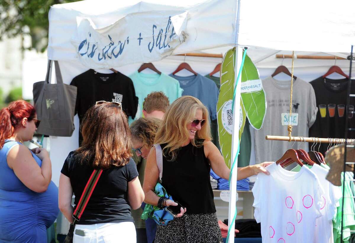 The annual Arts & Crafts on Bedford event on Bedford Street in downtown Stamford, Conn., on Saturday September 10, 2022. Arts & Crafts on Bedford brings juried artisans from throughout the Northeast who will display and sell juried works including ceramics, fiber arts, fine art, jewelry, metal, photography, painting, wood and more. Arts & Crafts on Bedford is presented by Stamford Downtown Special Services District and sponsored by 95.9 The Fox, Star 99.9, WEBE 108 and Happyhaha.com Photography.