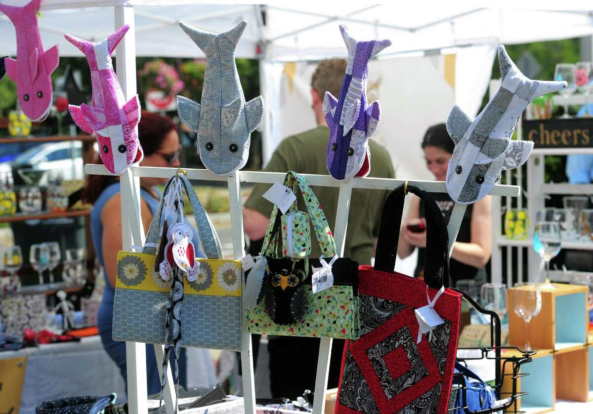The annual Arts & Crafts on Bedford event on Bedford Street in downtown Stamford, Conn., on Saturday September 10, 2022. Arts & Crafts on Bedford brings juried artisans from throughout the Northeast who will display and sell juried works including ceramics, fiber arts, fine art, jewelry, metal, photography, painting, wood and more. Arts & Crafts on Bedford is presented by Stamford Downtown Special Services District and sponsored by 95.9 The Fox, Star 99.9, WEBE 108 and Happyhaha.com Photography.