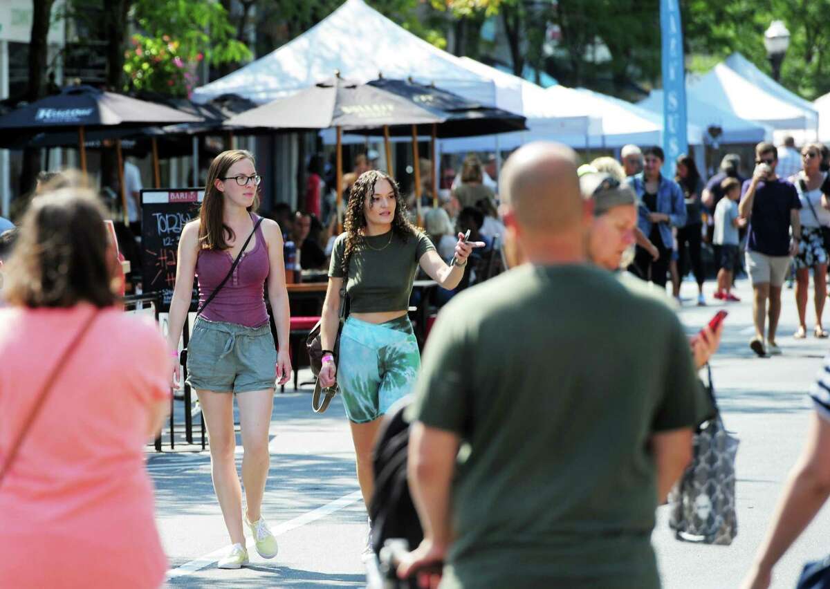 The annual Arts & Crafts on Bedford event on Bedford Street in downtown Stamford, Conn., on Saturday September 10, 2022. Arts & Crafts on Bedford brings juried artisans from throughout the Northeast who will display and sell juried works including ceramics, fiber arts, fine art, jewelry, metal, photography, painting, wood and more. Arts & Crafts on Bedford is presented by Stamford Downtown Special Services District and sponsored by 95.9 The Fox, Star 99.9, WEBE 108 and Happyhaha.com Photography.