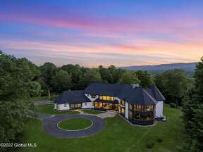 How much does this French Chateau-inspired estate in Greenfield cost?