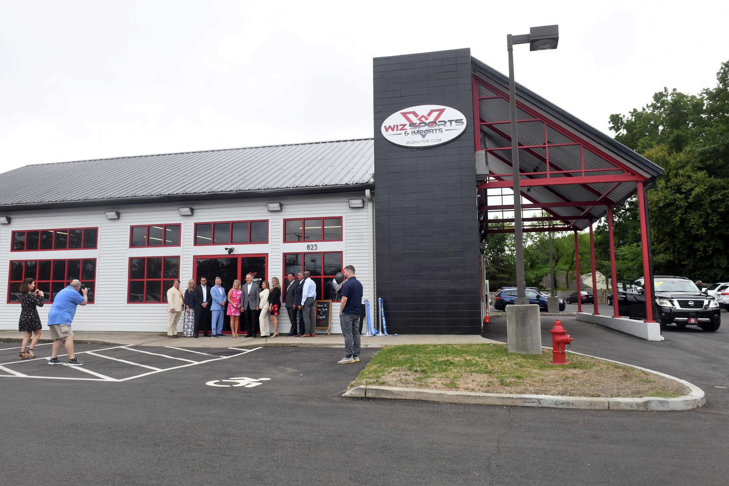 Wiz Auto Group opens dealership at former Milford Land Rover location