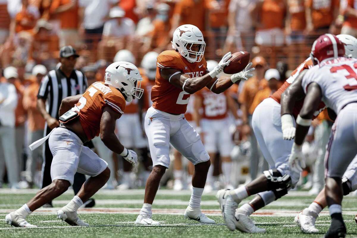 Roschon Johnson delivered 189 total yards on 33 touches as Texas’ wildcat quarterback last year against Kansas State. The bruising tailback could be pressed into service under center again.