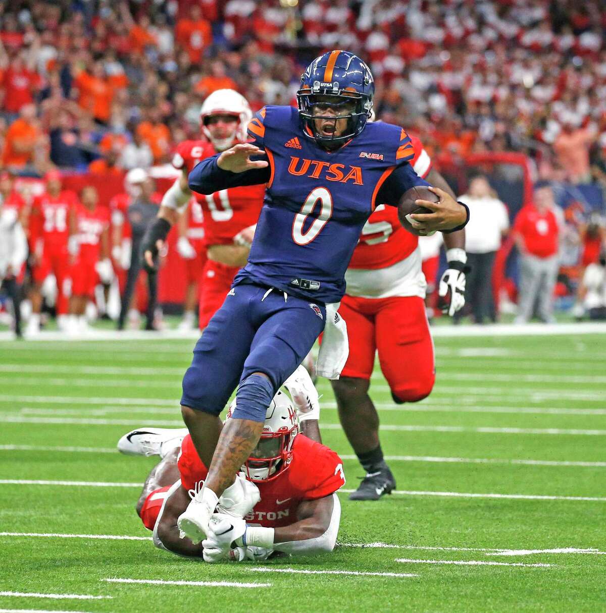 UTSA quarterback Frank Harris has contributed with his legs this season, as well, rushing for 93 yards and a touchdown over the Roadrunners’ first two games.