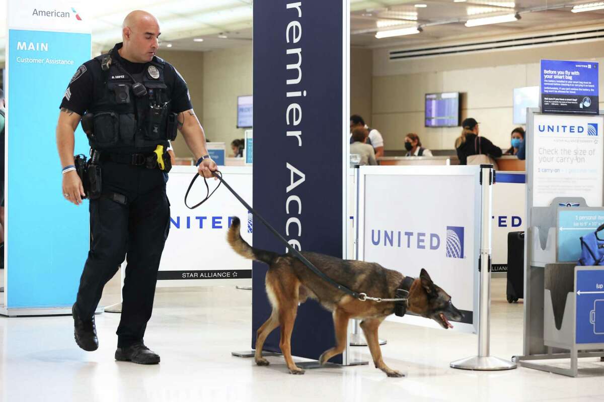 The San Antonio Police Airport K9 Unit trains in Terminal B at the San Antonio International Airport on Tuesday.