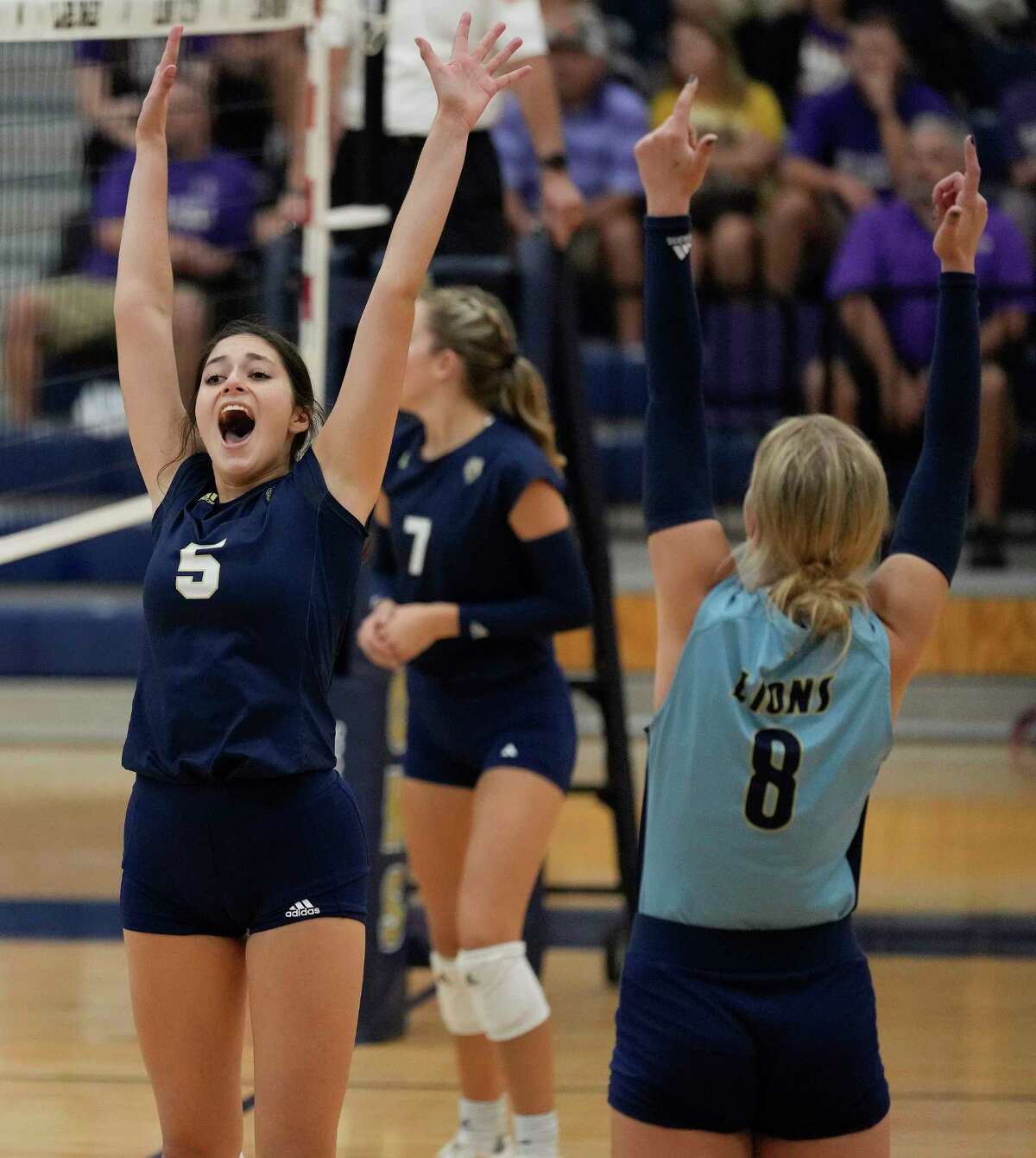 Lake Creek's Elizabeth Gunn (5) celebrates the team’s winning of the first set during a high school volleyball match against Montgomery, Tuesday, Sept. 13, 2022, in Montgomery, TX.