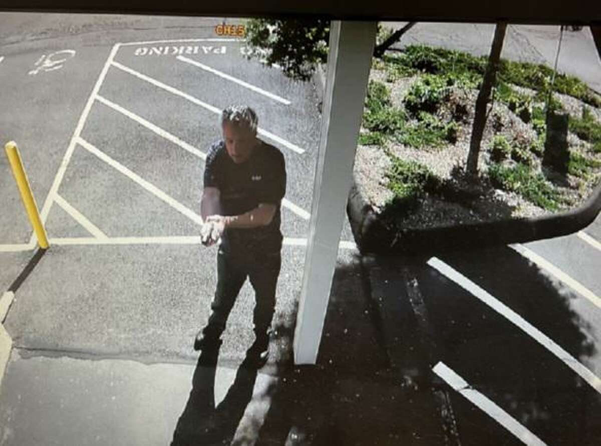 Security footage shows Philip Caseria, 60, of Shelton, with a loaded gun drawn as he walks into a Monroe wine shop last weekend, police said.