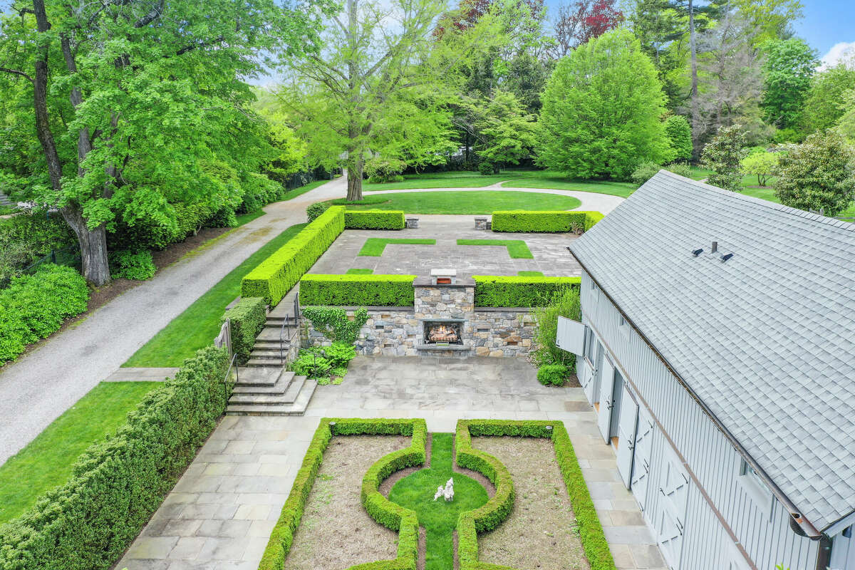 Formerly part of the Rockefeller estate, the 2.94-acre property at 465 Lake Ave., Greenwich, is on the market for $8.5 million. The property affords a buyer the opportunity to build their dream compound on the site, which comes with a one-bedroom guest house and an outdoor entertaining space designed Francois Goffinet.