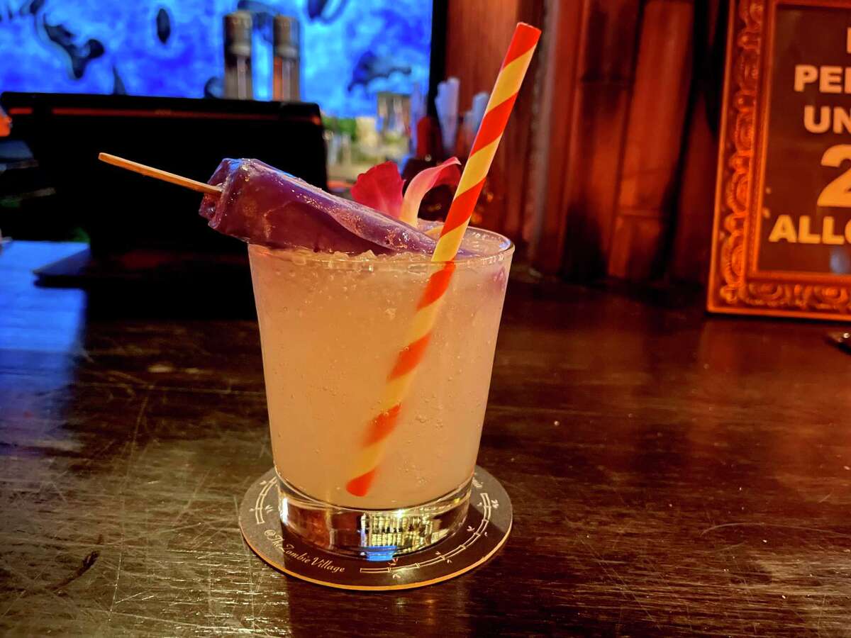 The Coco Pandan cocktail at Zombie Village in San Francisco, a rum drink topped with a coconut-lychee popsicle.