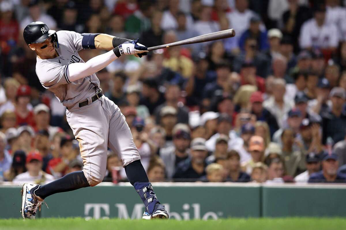 Aaron Judge of the New York Yankees hits a solo home run against the Boston Red Sox during the eighth inning at Fenway Park on Tuesday, Sept. 13, 2022, in Boston. (Maddie Meyer/Getty Images/TNS)