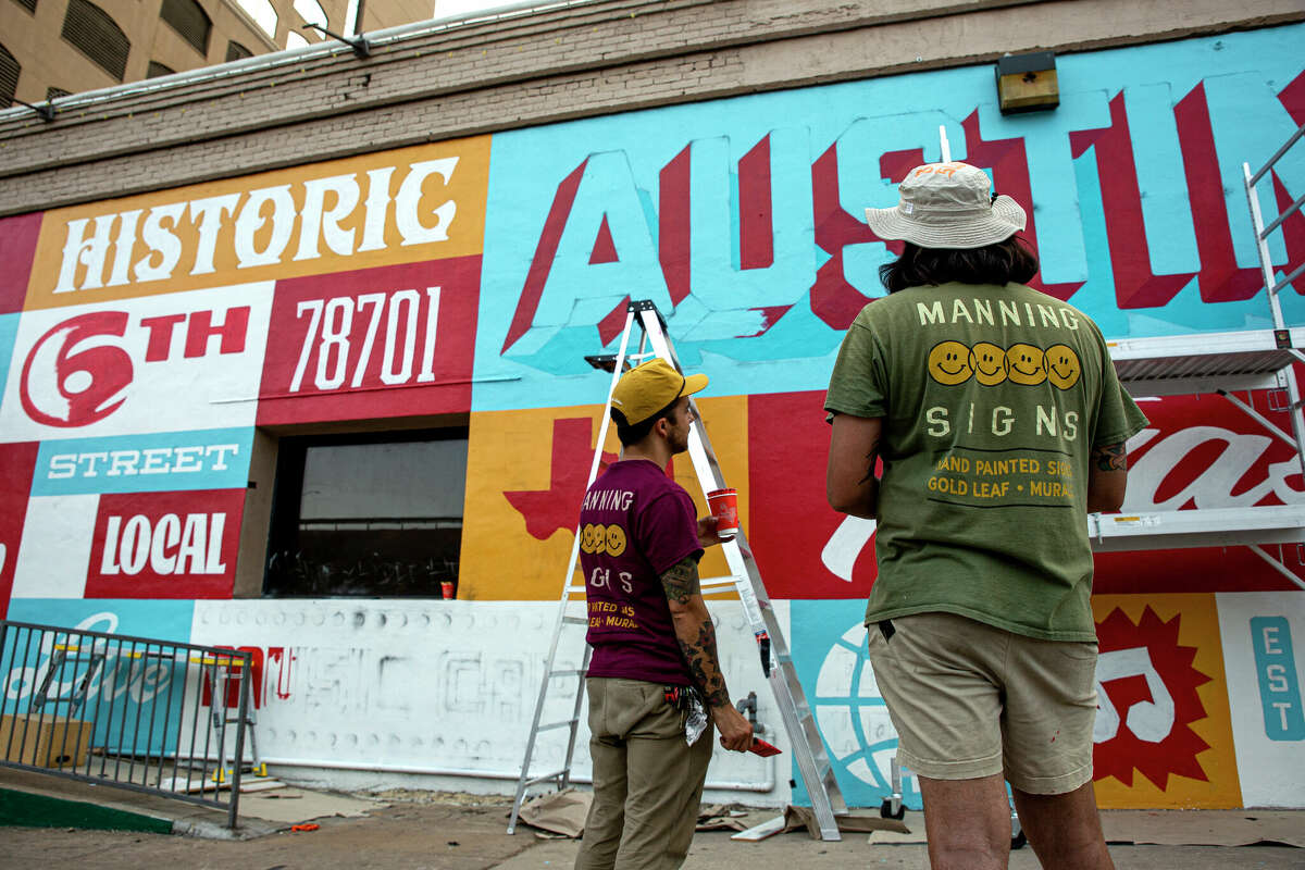 Manning donated the refresh of the iconic Sixth Street mural, which was faded and covered in graffiti.