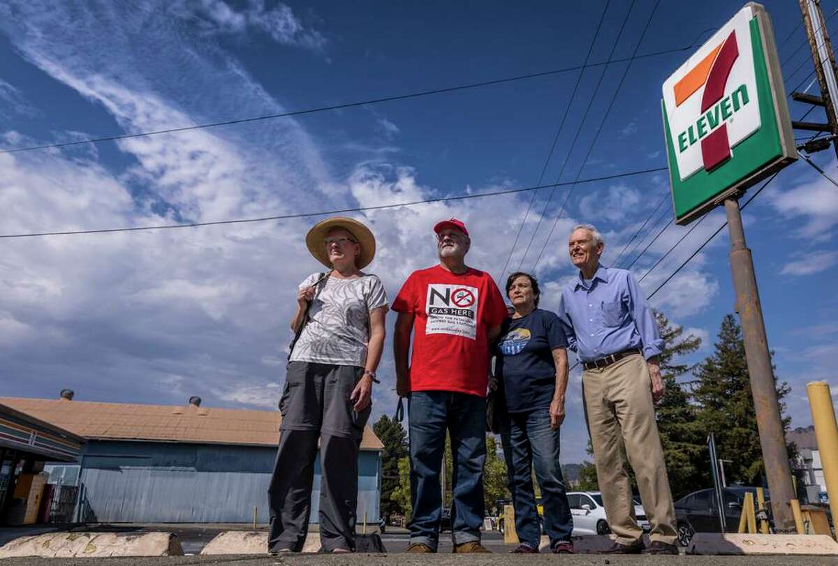 Jenny Blaker (left), Woody Hastings, Karen Preuss and Steve Birdlebough of the Coalition Opposing New Gas Stations. 