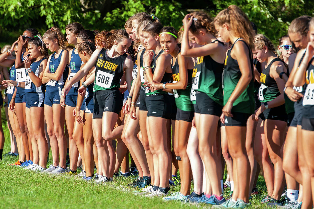 PHOTOS Dow and Midland track teams run at Northwood