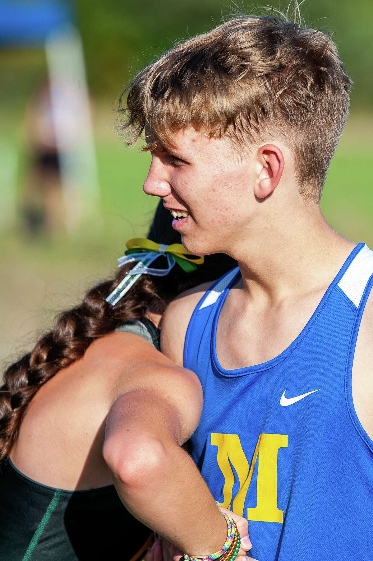 PHOTOS Dow and Midland track teams run at Northwood