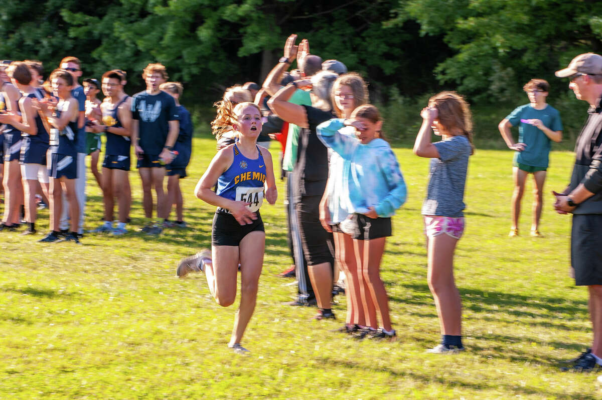 PHOTOS Dow and Midland track teams run at Northwood