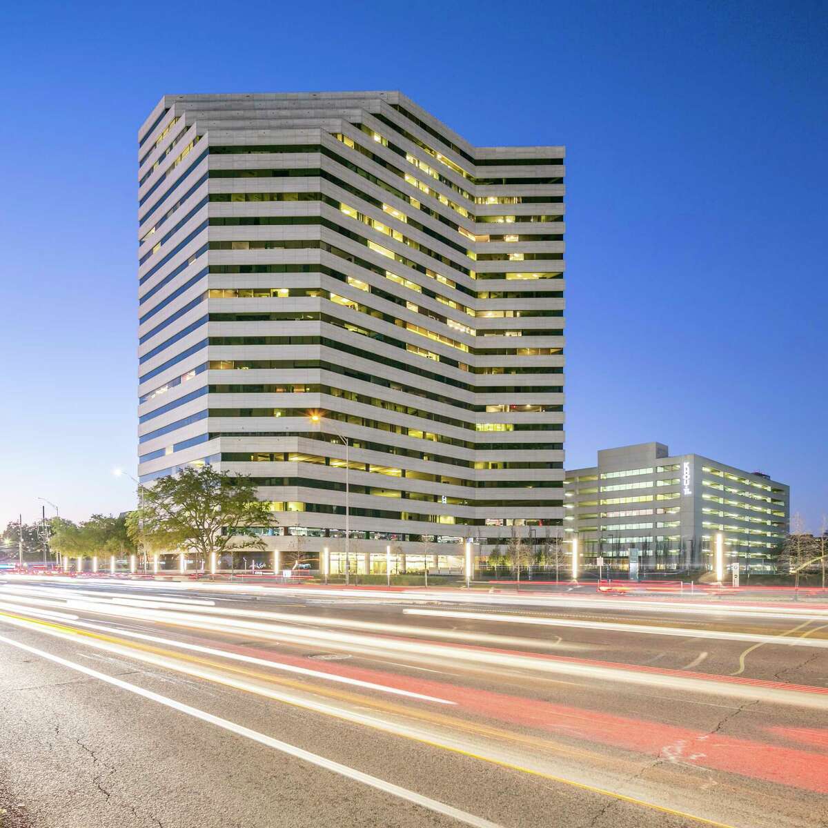 Group RMC acquired the 22-story 5718 Westheimer office building in October 2021. CBRE handles leasing.