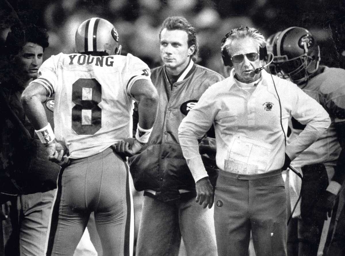 Seen in 1990, 49ers head coach George Seifert had a difficult balancing act with quarterbacks Steve Young and Joe Montana.