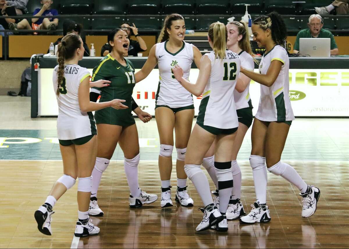 The Midland College volleyball team celebrates against Clarendon College at Chaparral Center on 9/14/2022. 